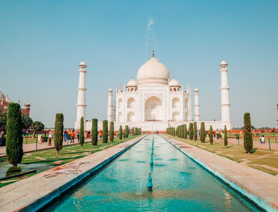 The Taj Mahal in Agra India with gardens and reflecting pool