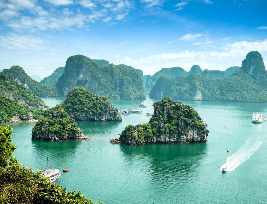 Limestone karst islands and blue water in Ha Long Bay Vietnam