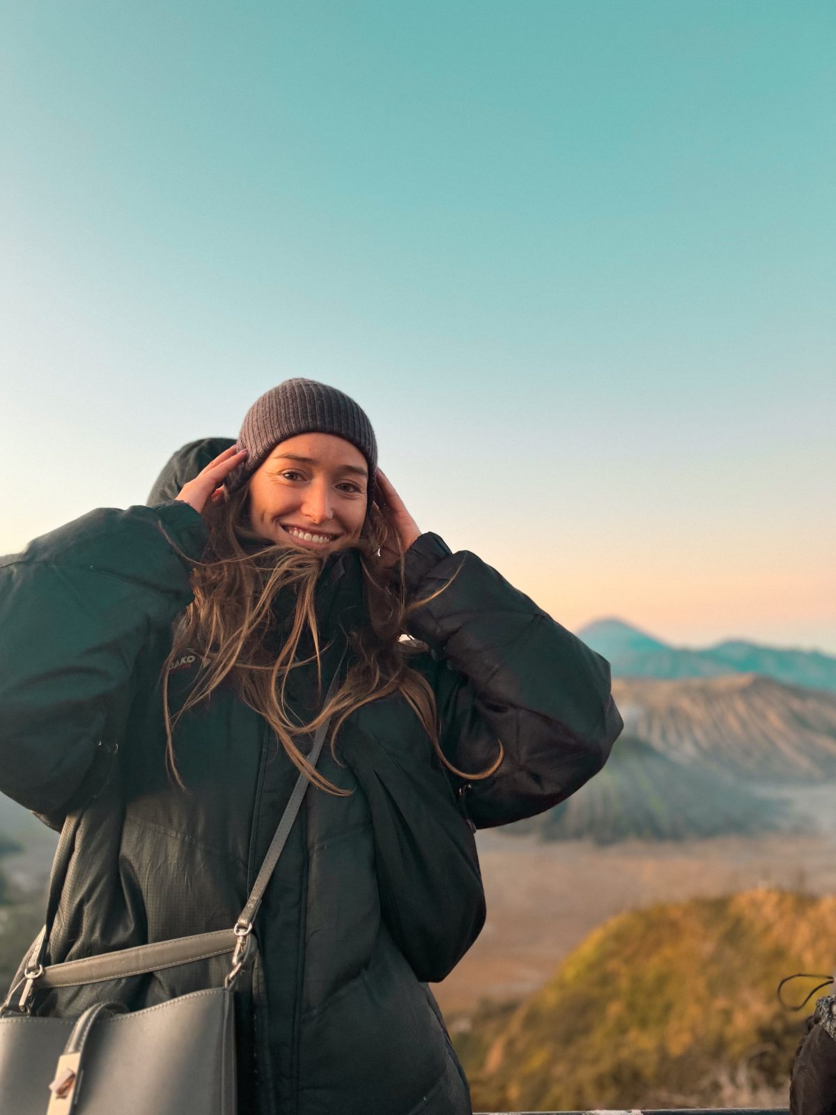 Traveler standing at a Mount Bromo sunrise viewpoint in East Java, Indonesia