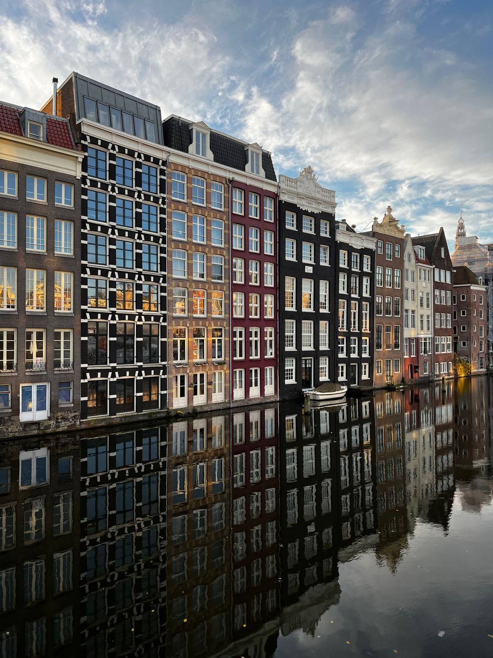 Traditional canal houses along the water in Amsterdam Netherlands