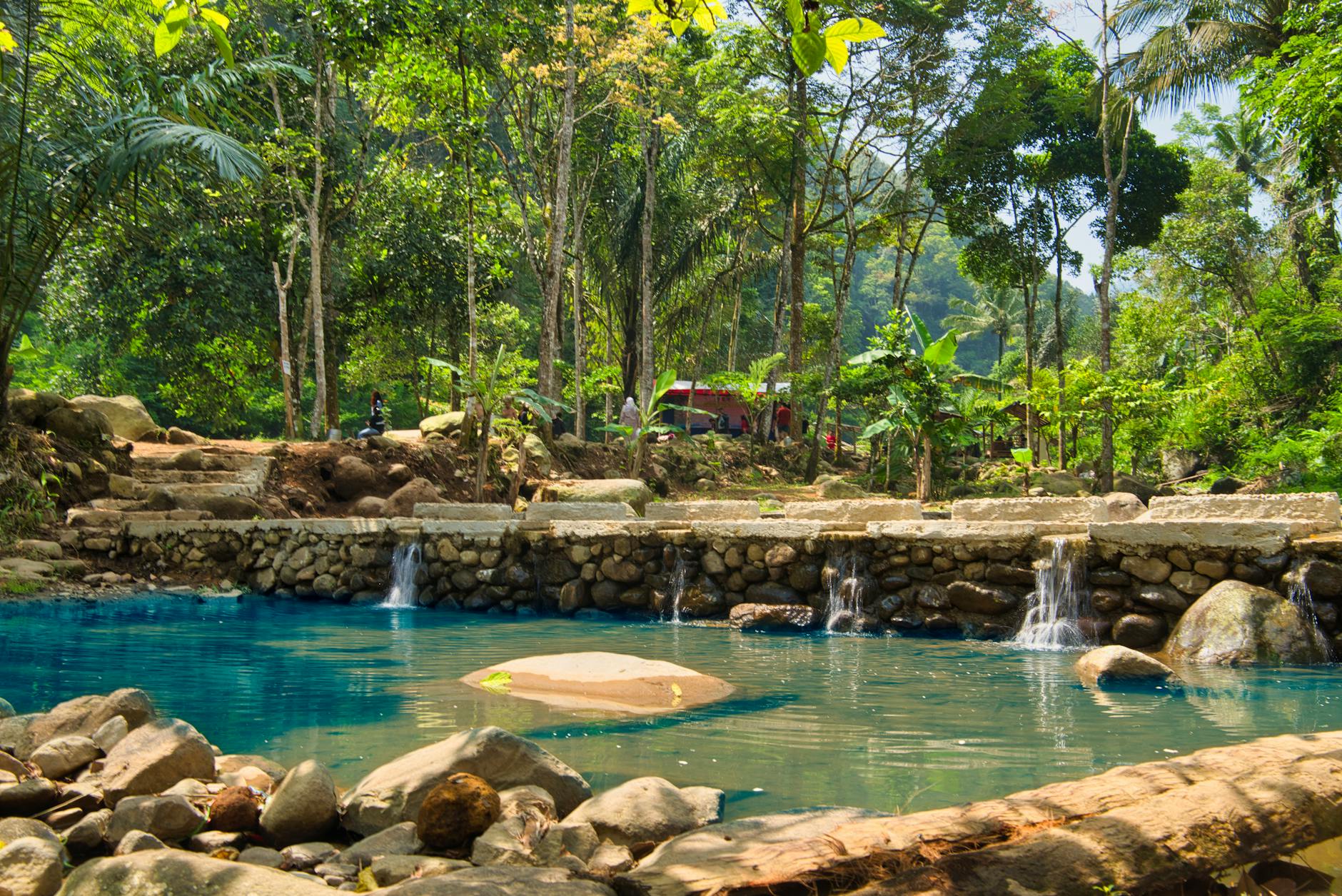 Warm water pools surrounded by tropical greenery at Banjar Hot Springs near Lovina