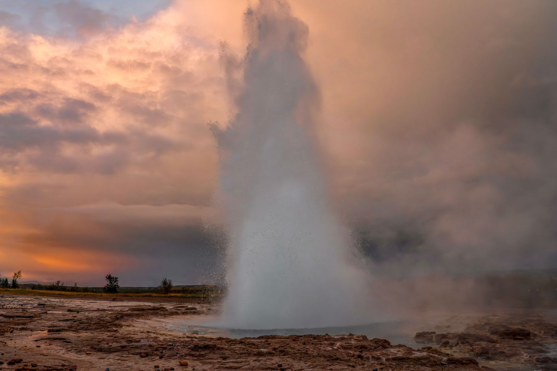 Geyser erupting into the sky in Iceland