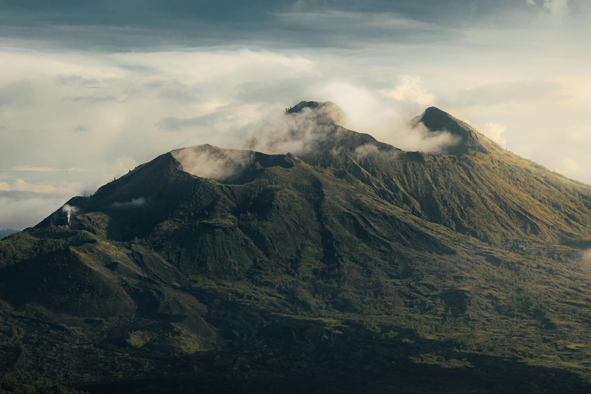 Clouds rolling over Mount Batur volcano in Kintamani, Bali