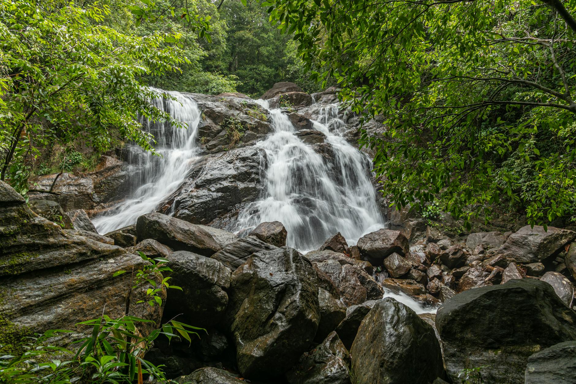 Jagasatru Waterfall surrounded by jungle near Sidemen, Bali