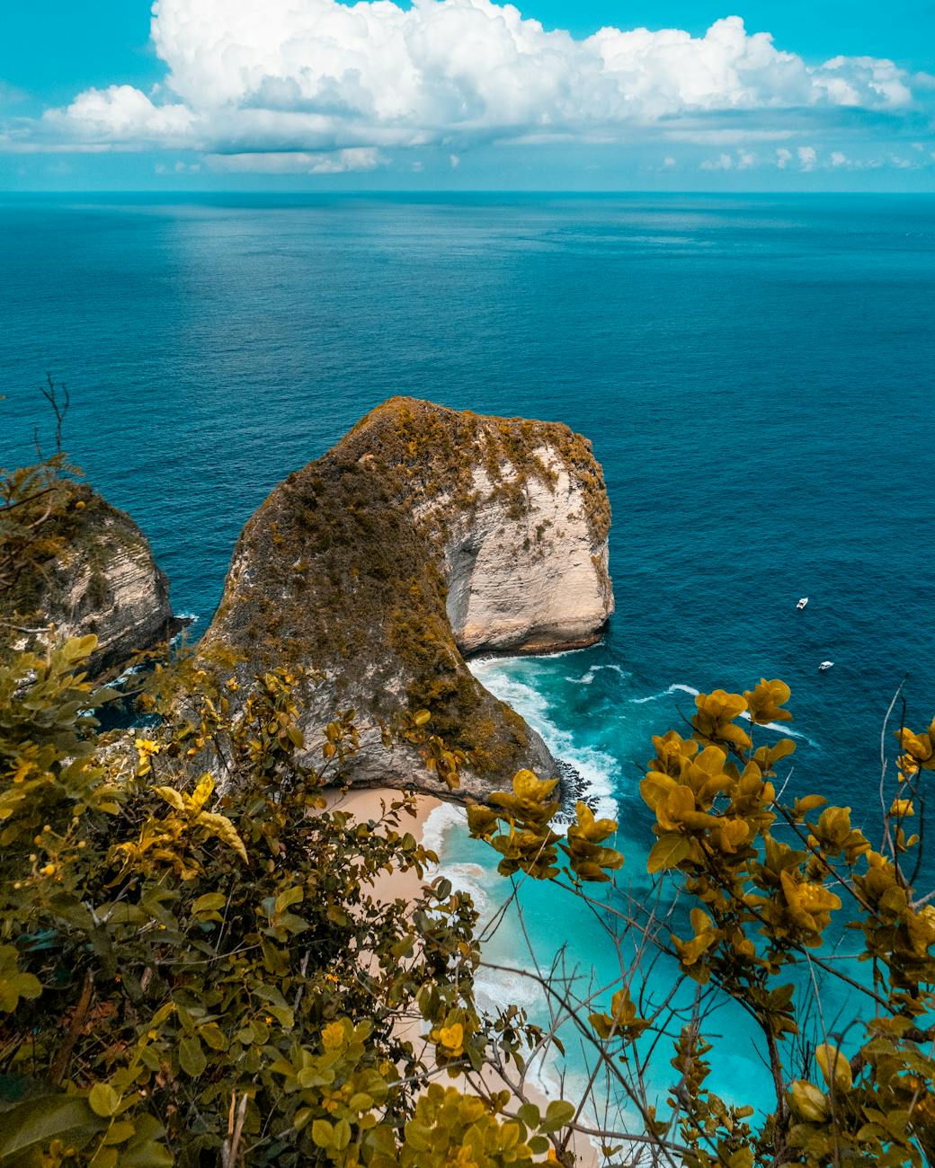View of Diamond Beach cliffs and turquoise water in Nusa Penida, Bali
