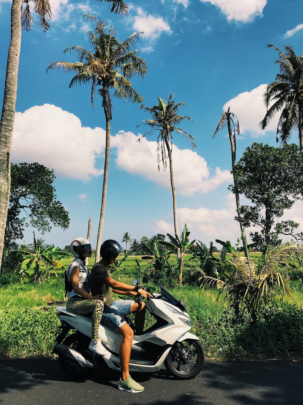 Scooter ride along the coastal road in Amed, Bali