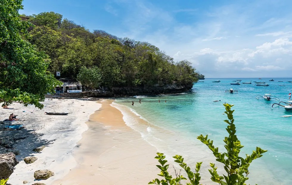 Coconut Beach with calm waves and turquoise water in Nusa Lembongan
