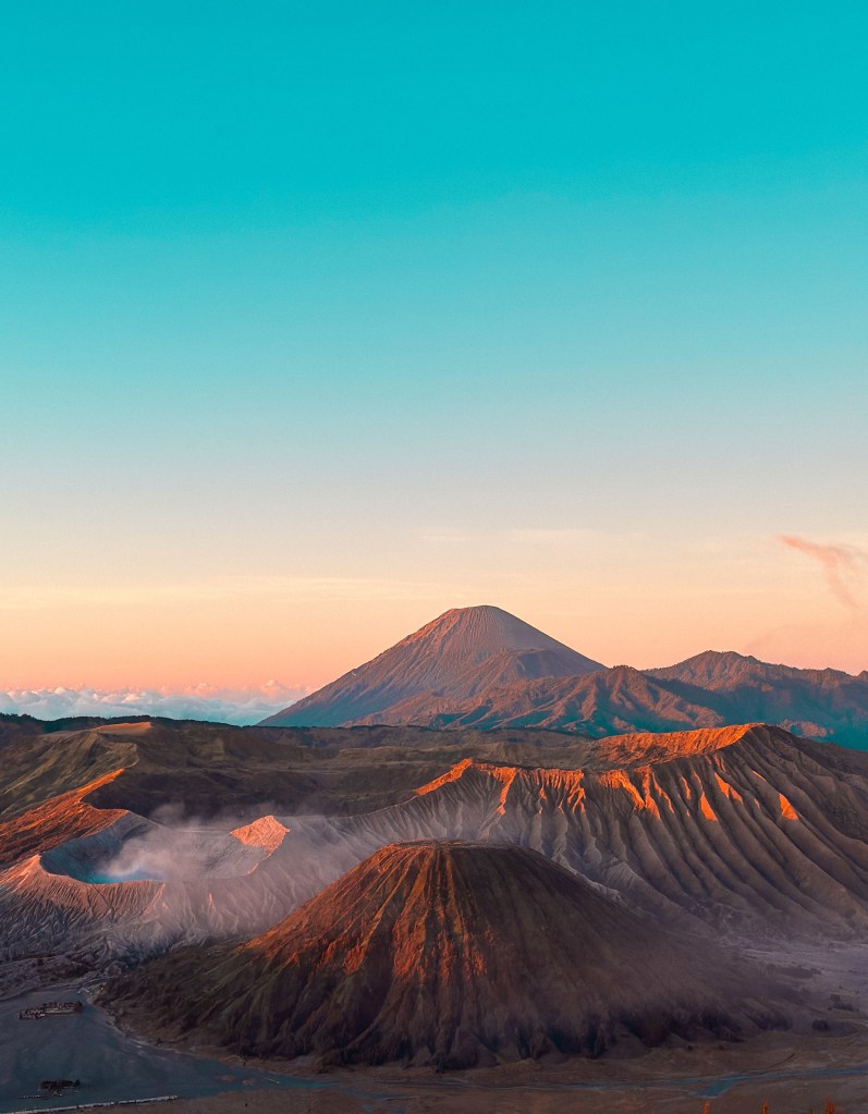 Sunrise view over Mount Bromo, Mount Batok, and Mount Semeru in Bromo Tengger Semeru National Park