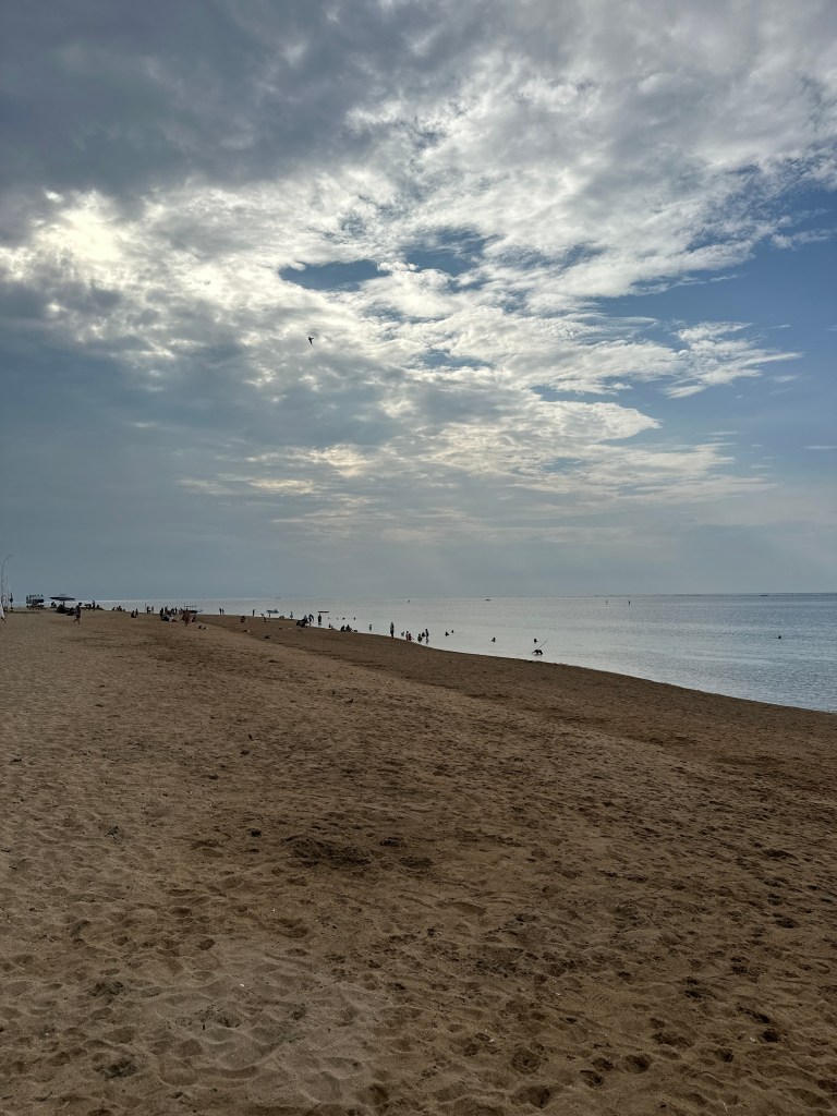 Quiet beach path along Sanur Beach with ocean views in Bali