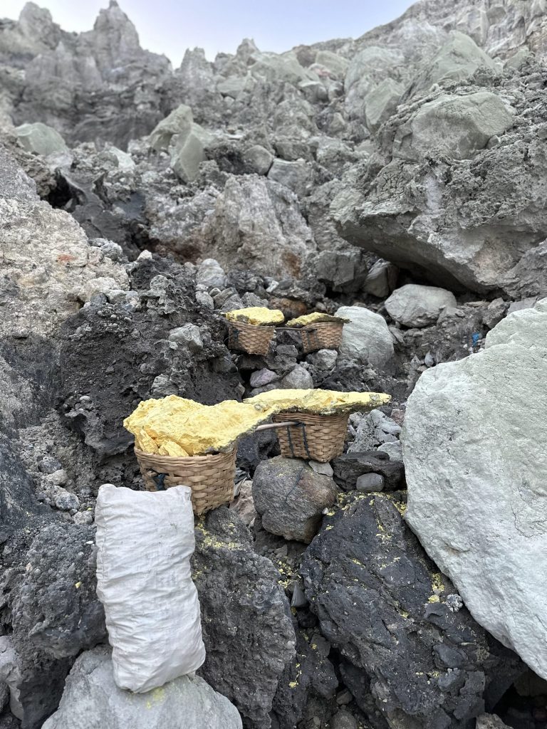 Sulfur baskets on the rocky crater trail at Kawah Ijen Indonesia