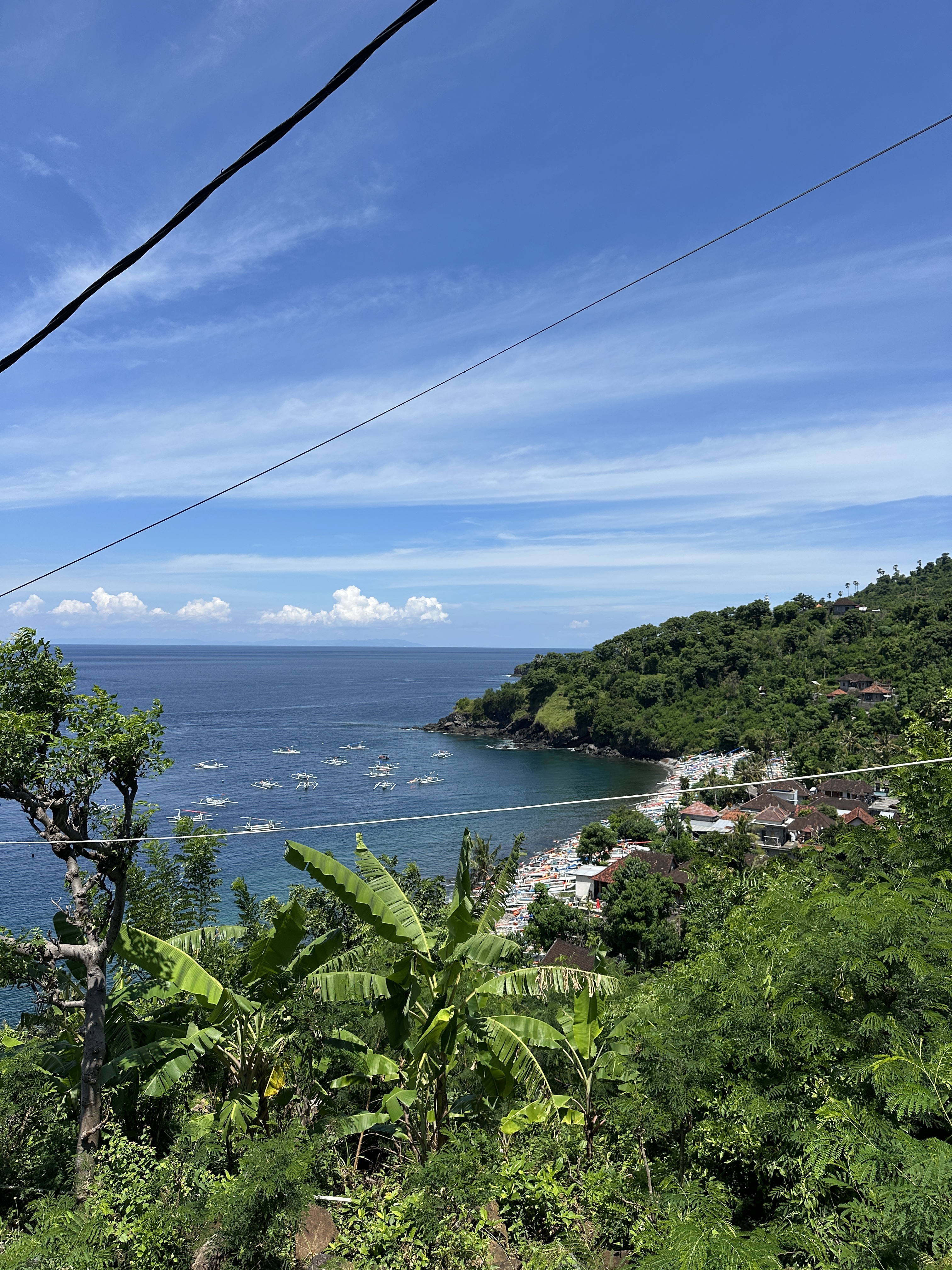 Ocean and hillside view over Amed’s coastline in East Bali, Indonesia