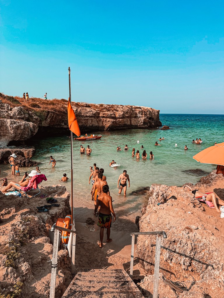 Rocky beach with clear turquoise water in Puglia Italy