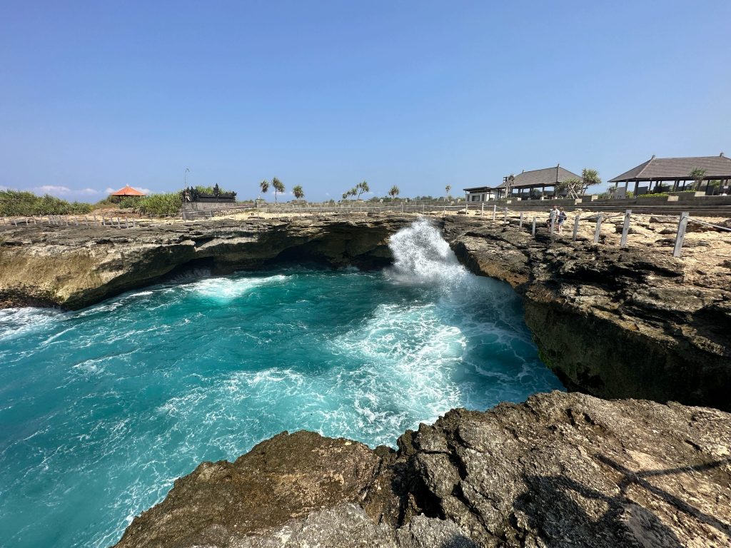 Waves crashing into the cliffs at Devil’s Tear in Nusa Lembongan