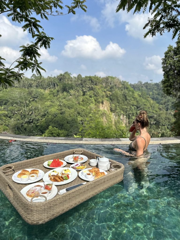 Floating breakfast in a private pool surrounded by jungle in Ubud, Bali