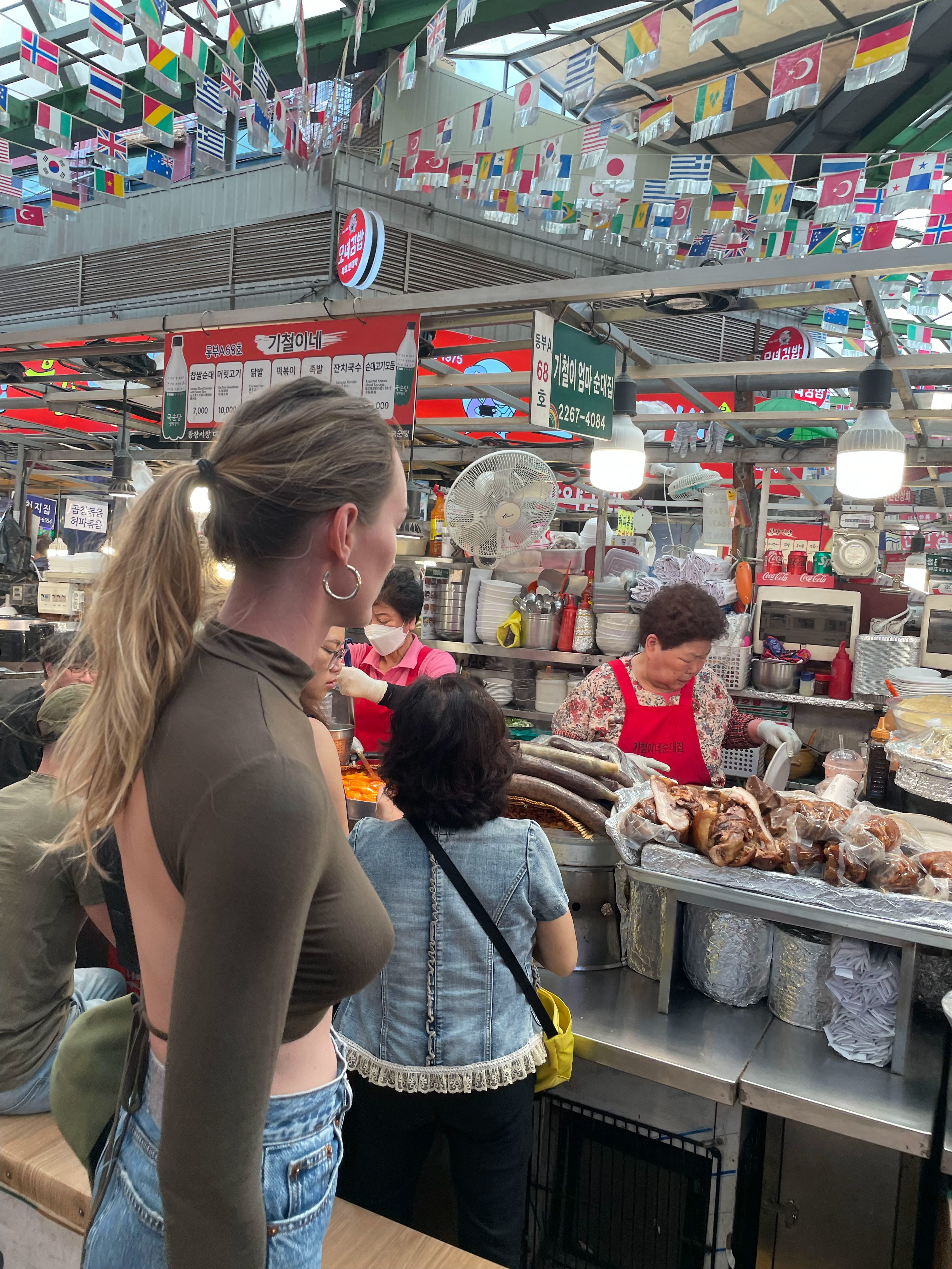 Carlijn exploring a busy Korean food market in South Korea