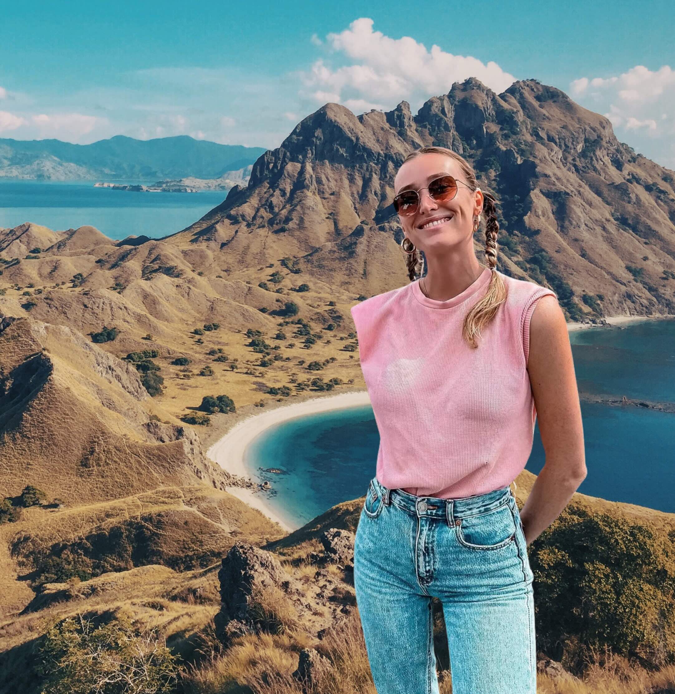 Carlijn standing at a dramatic island viewpoint in Komodo National Park for her Indonesia travel guide
