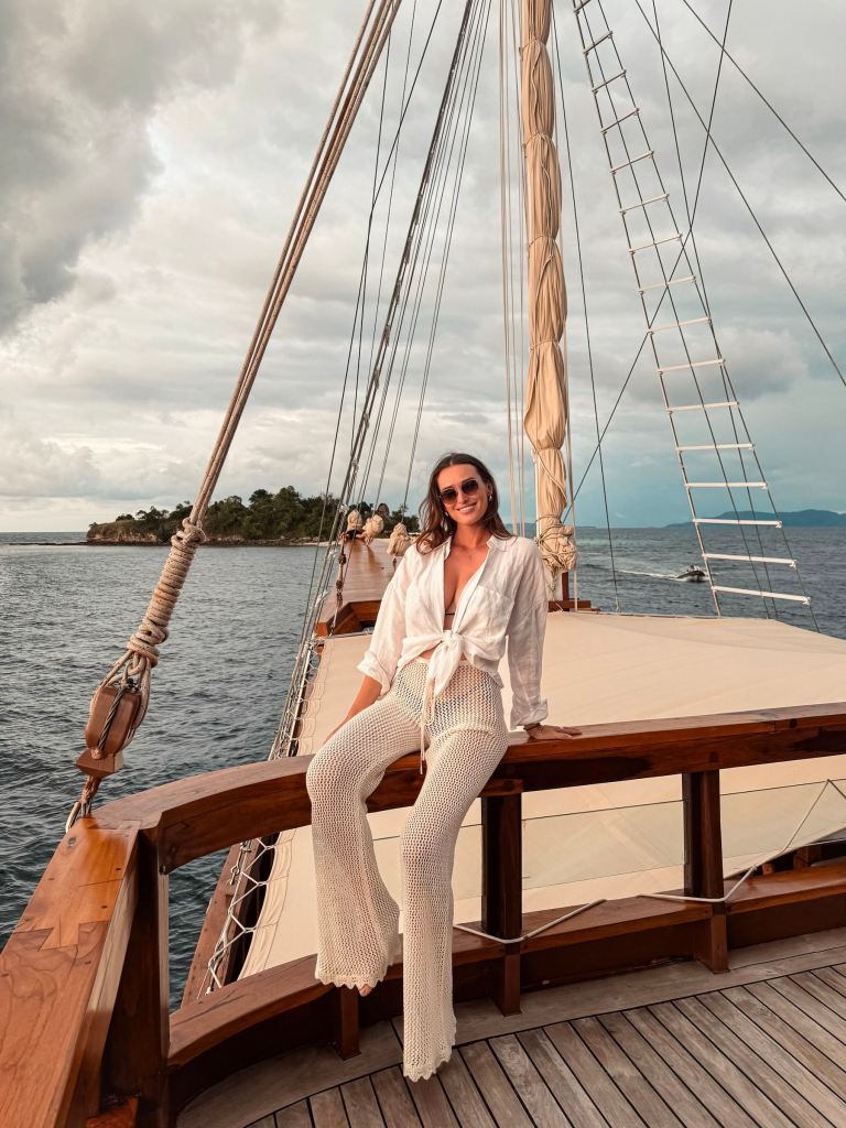 Carlijn sitting on the deck of a Komodo liveaboard in Komodo National Park, Indonesia.