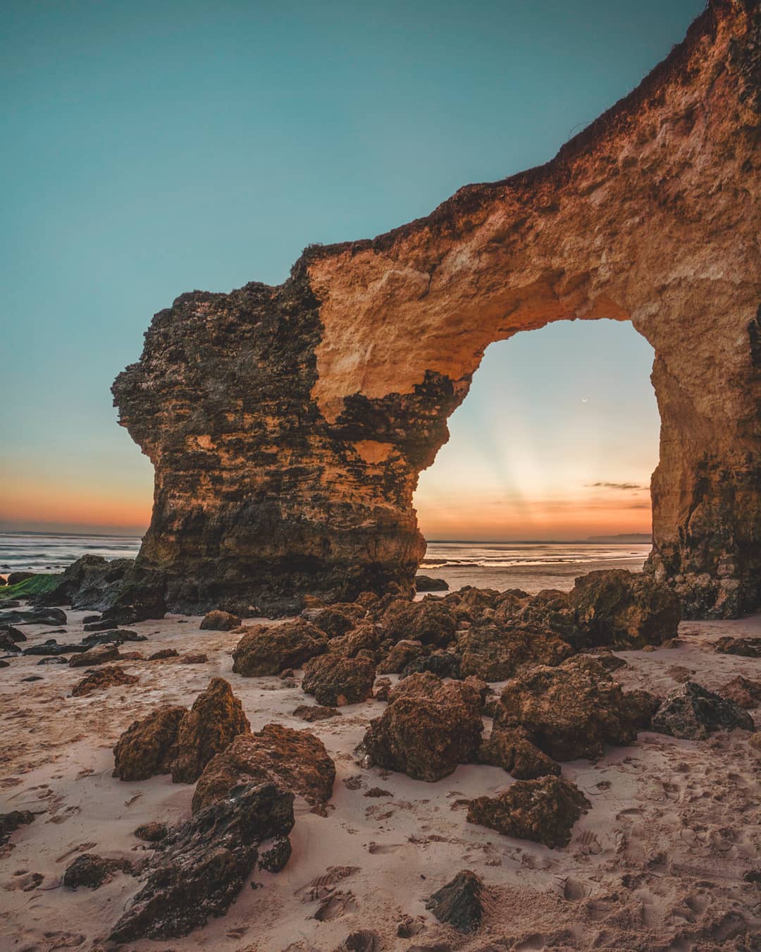 Natural rock arch at Mbawana Beach on the south coast of Sumba