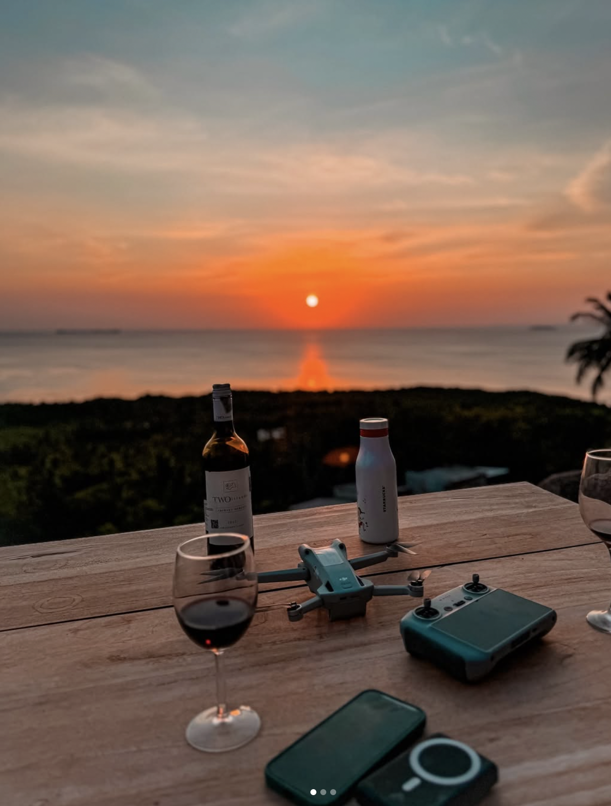 Sunset drinks at Bukit Love viewpoint overlooking Karimunjawa Island