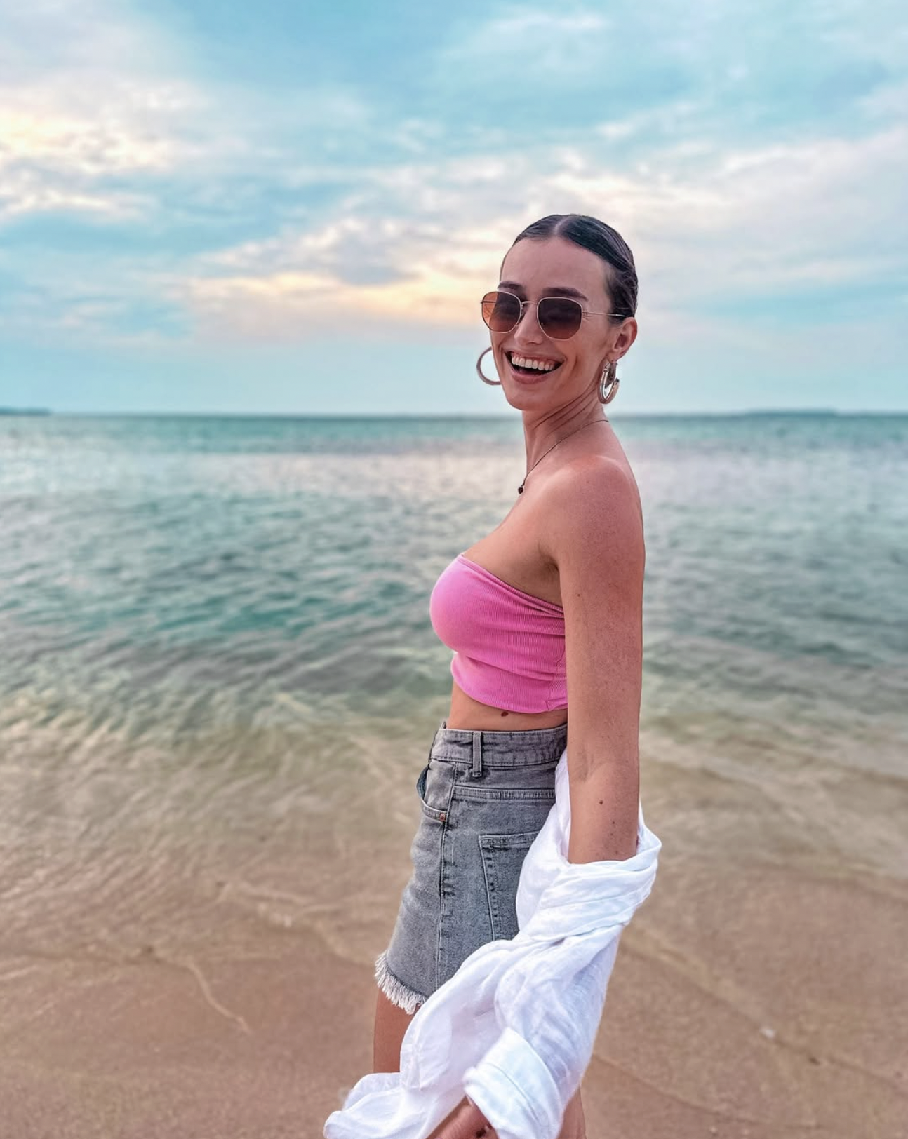 Carlijn smiling by the sea during sunset on Karimunjawa Island