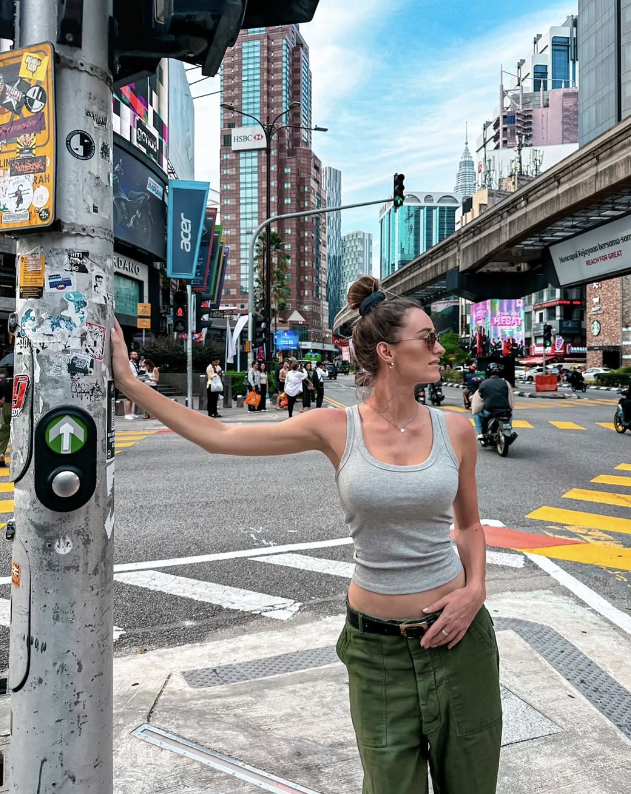 Carlijn crossing a busy street in Bukit Bintang, Kuala Lumpur
