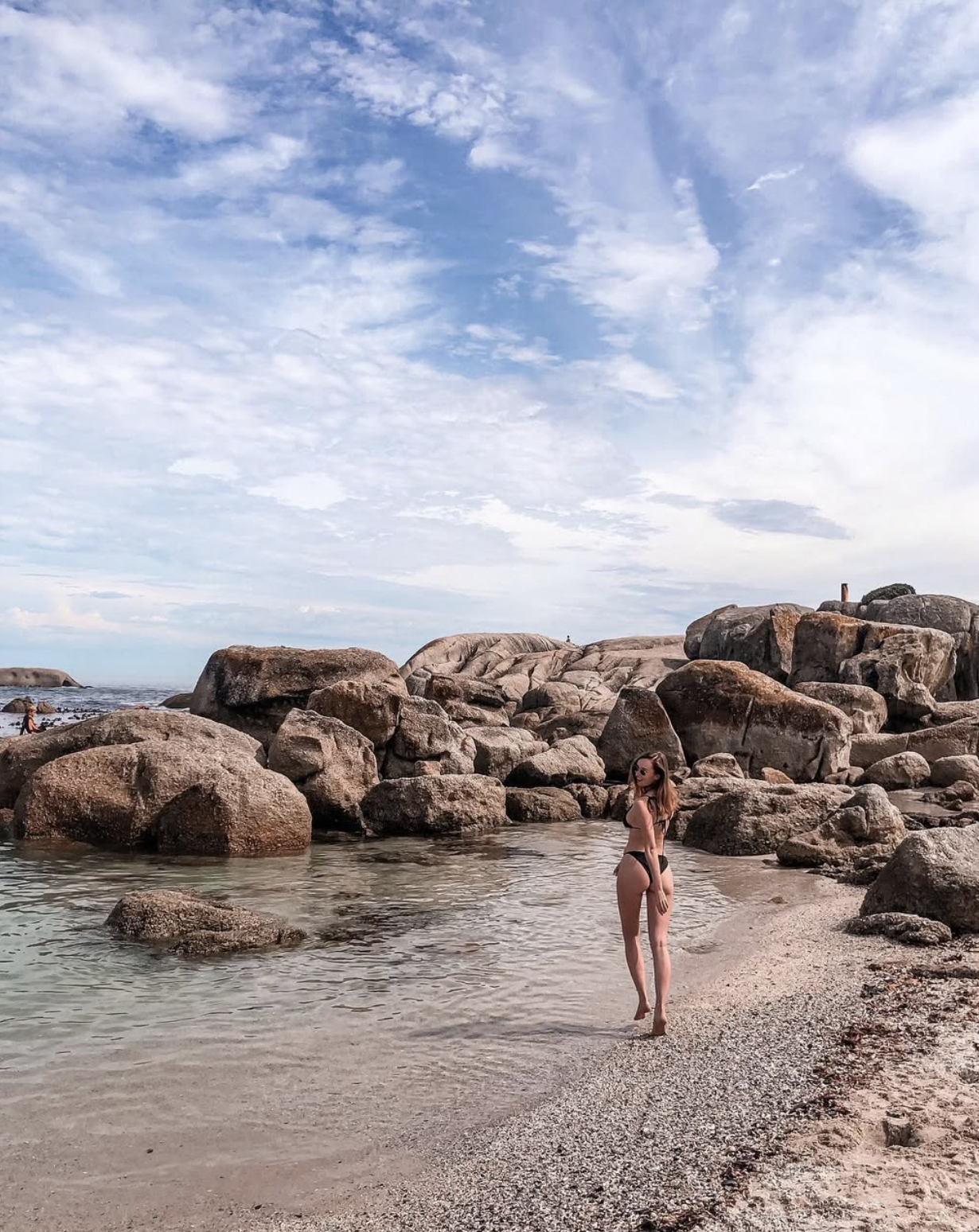 Carlijn standing at Boulders Beach near Cape Town, South Africa