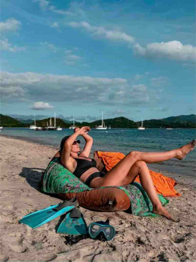 Relaxed beach day with snorkeling gear on the sand in Lombok, Indonesia