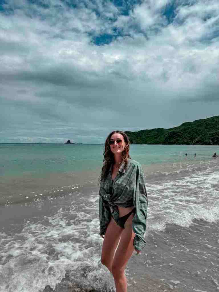 Traveler standing on a beach in Kuta Lombok, Indonesia