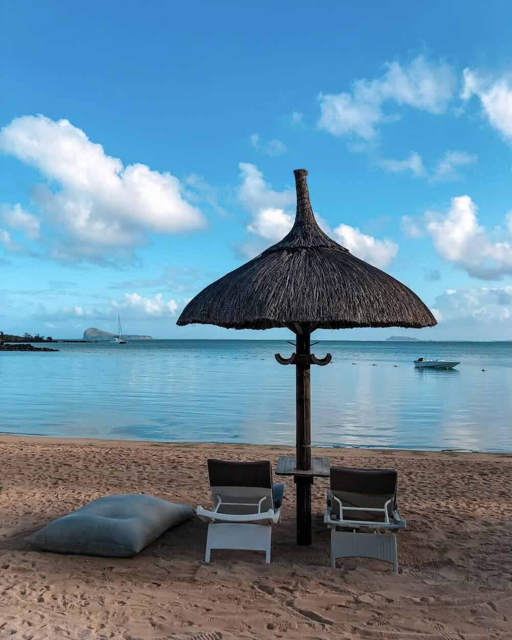 White sandy beach with crystal-clear turquoise water in Mauritius.