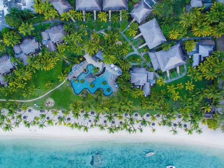 Aerial view of LUX* Le Morne resort beside the beach in southwest Mauritius.
