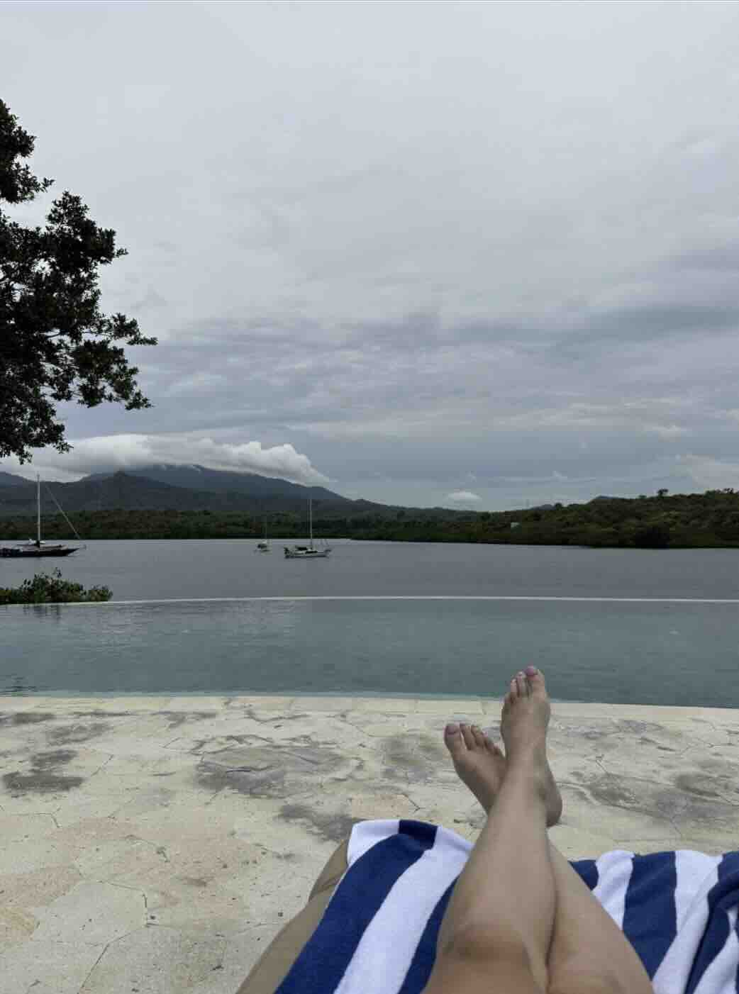 Poolside view overlooking calm water near Menjangan Island in West Bali