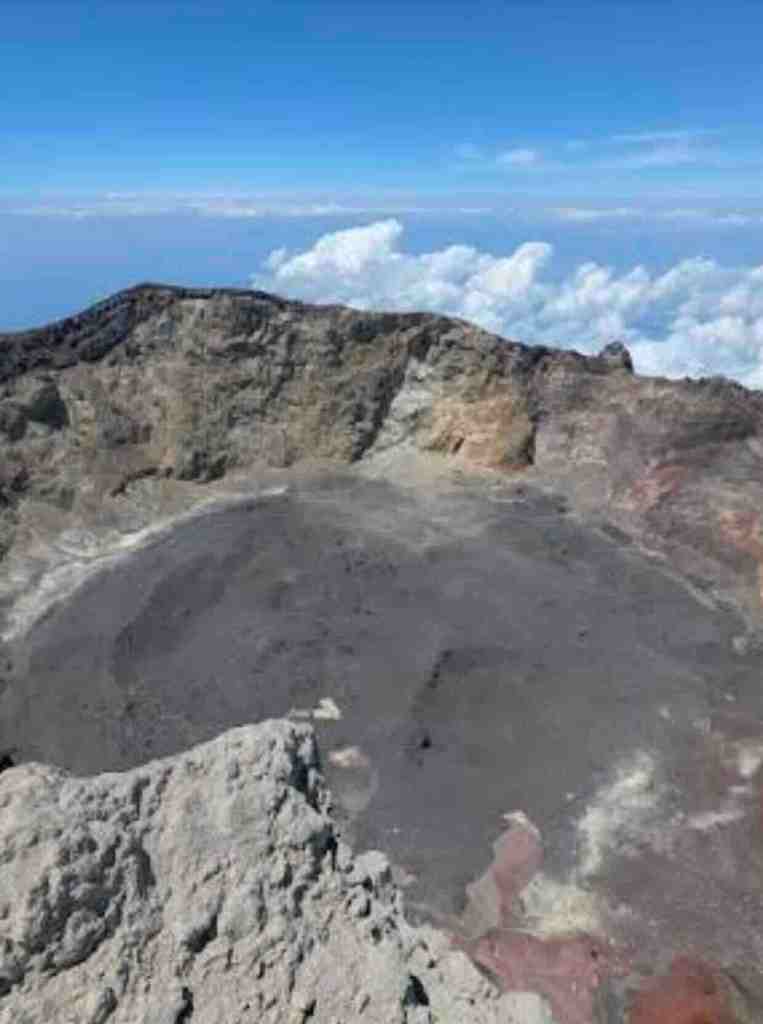 View into the crater of Mount Agung from the summit area in Bali