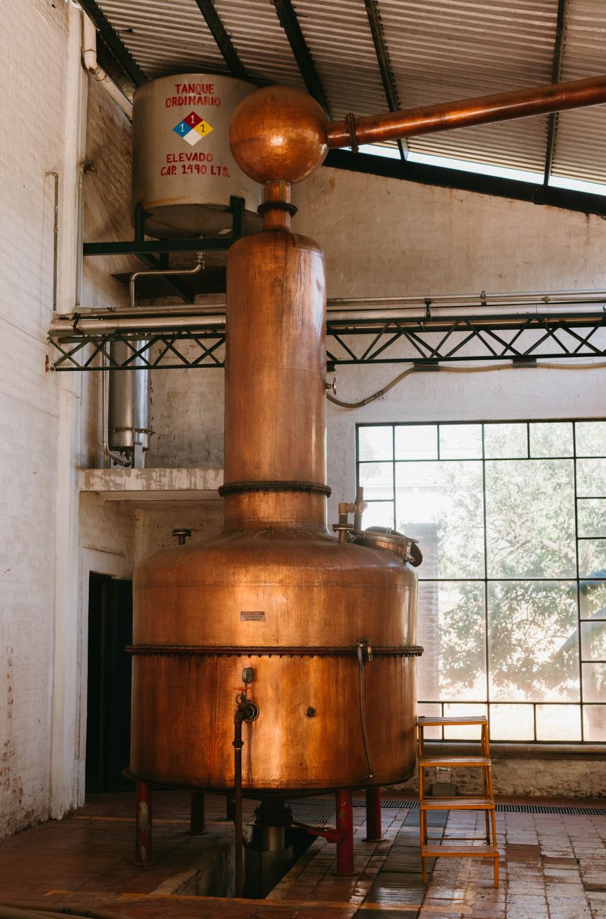 A big copper container that is used to distil Rum at Chamarel rum distillery.