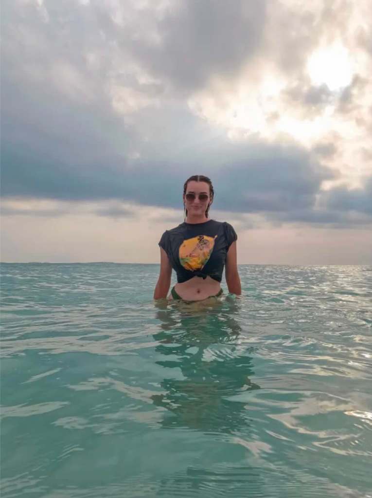 Swimming in the turquoise water of Weekuri Lagoon in West Sumba, one of the island’s most beautiful spots.