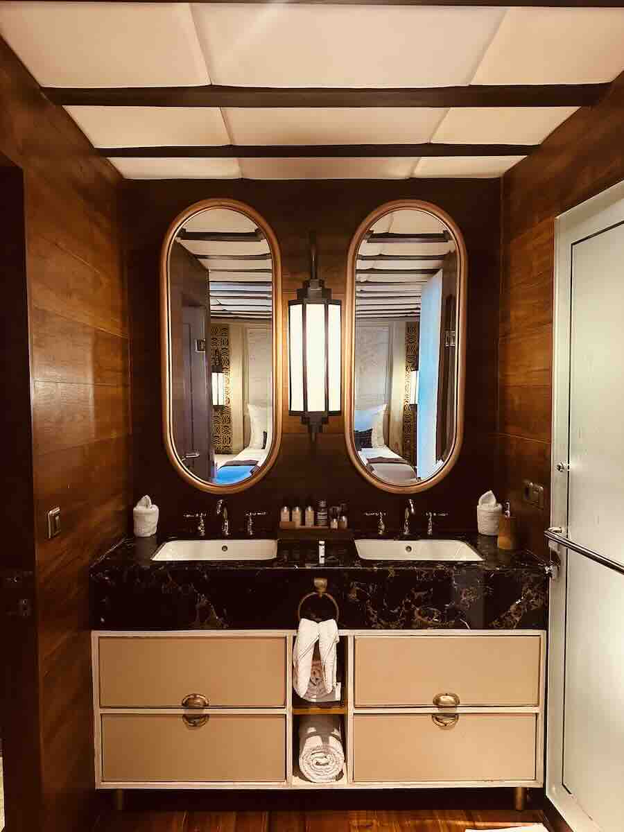 Wooden double-vanity bathroom inside the MAJ Oceanic luxury Komodo liveaboard.