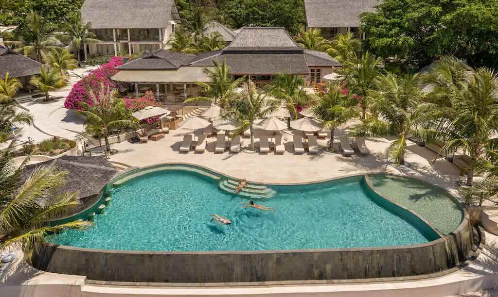 Swimming pool and tropical grounds at Eliana Resort in Rote Island