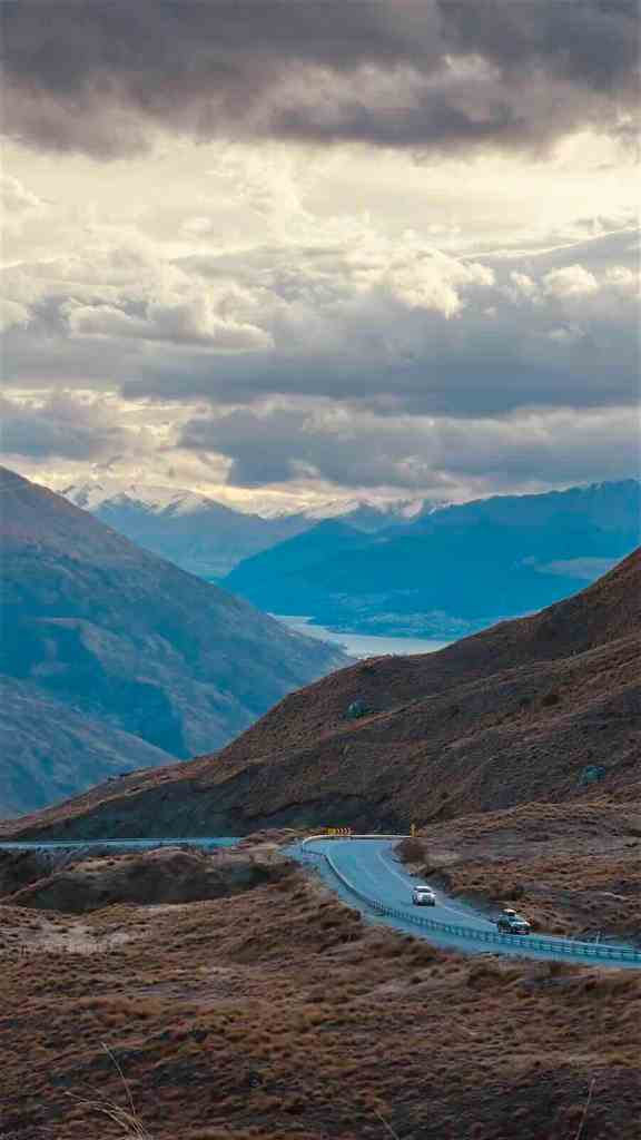 Kawarau River winding through dry mountain scenery beside SH6 in Central Otago.