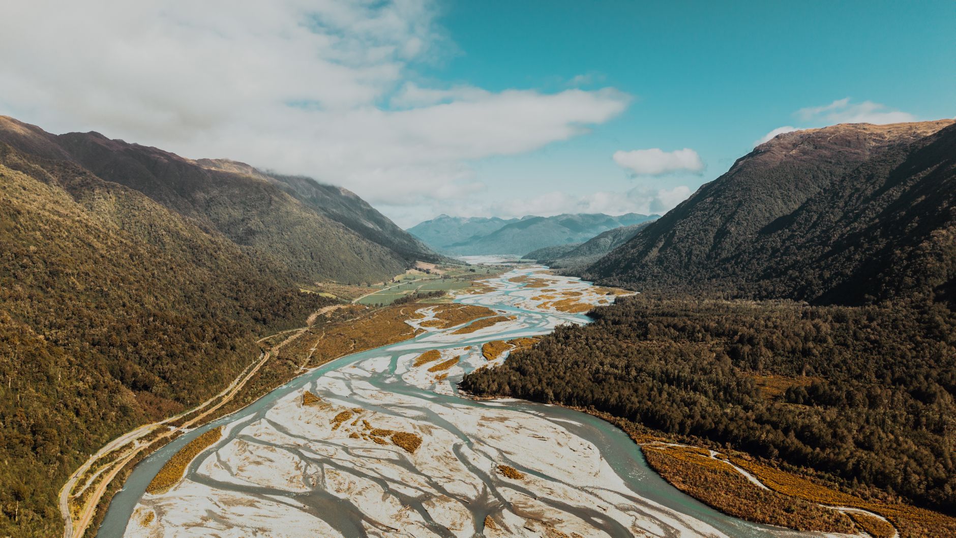 Braided river valley and mountain scenery beside SH6 on the Haast Pass drive.