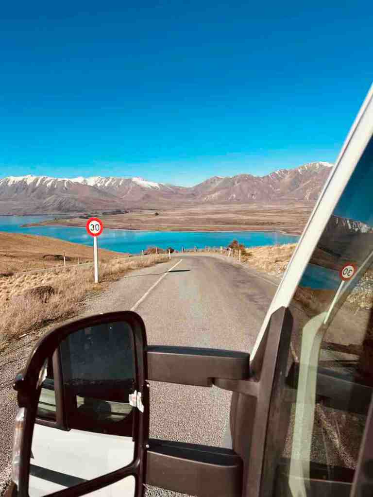 The view from our campervan while driving beside one of the turquoise alpine lakes on New Zealand’s South Island.